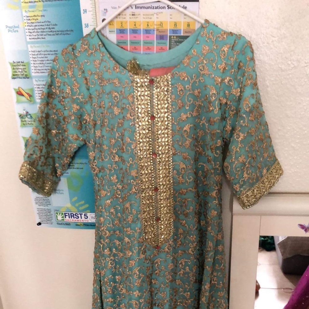 light sky dress wit peach dupatta